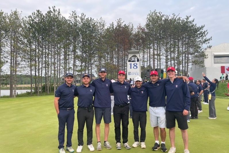 Group photo of Golf Canada team and Waterloo co-op students at a Golf event