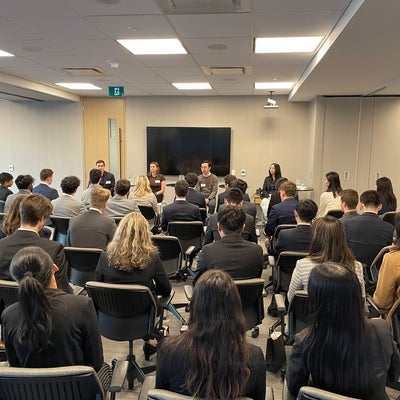 OMERS employees and co-op students in a large in-person meeting