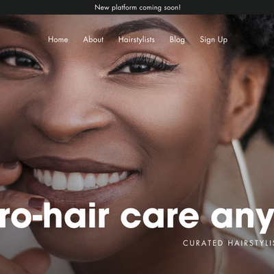 Image of the BeBlended website homepage with a black female model smiling as the background image