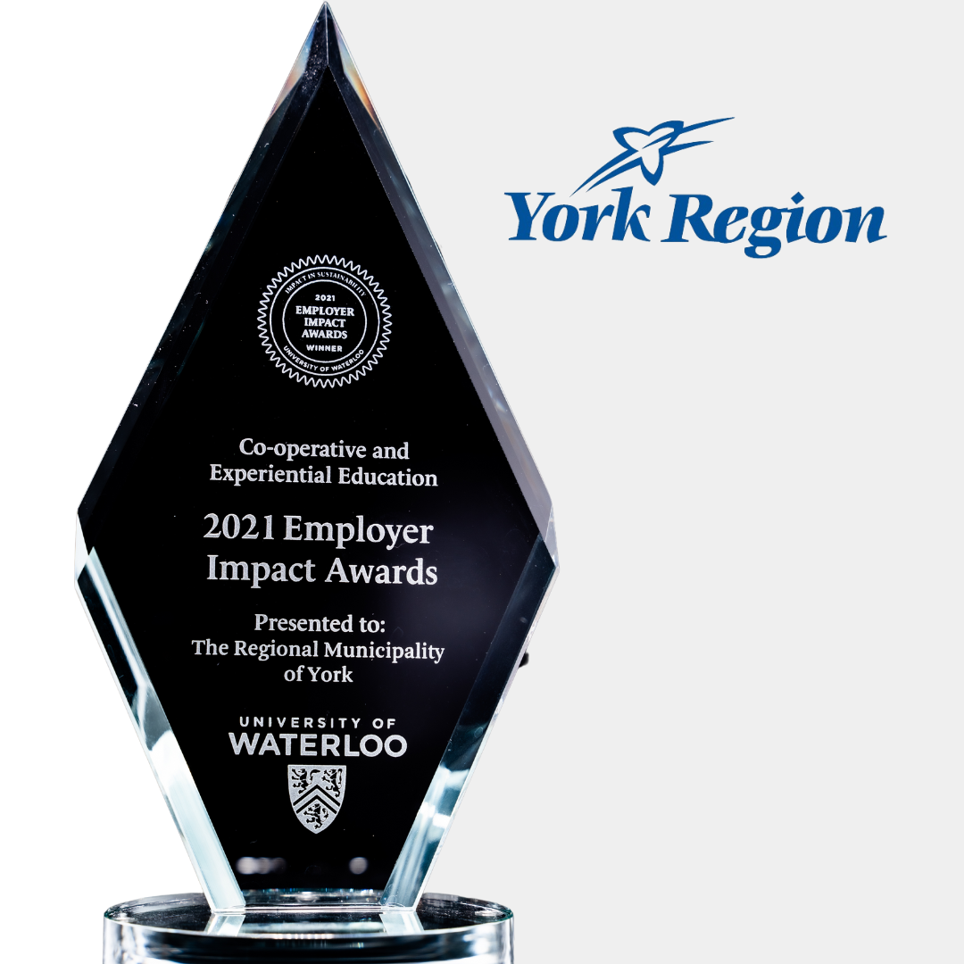 Diamond shaped glass trophy with the york region logo beside it