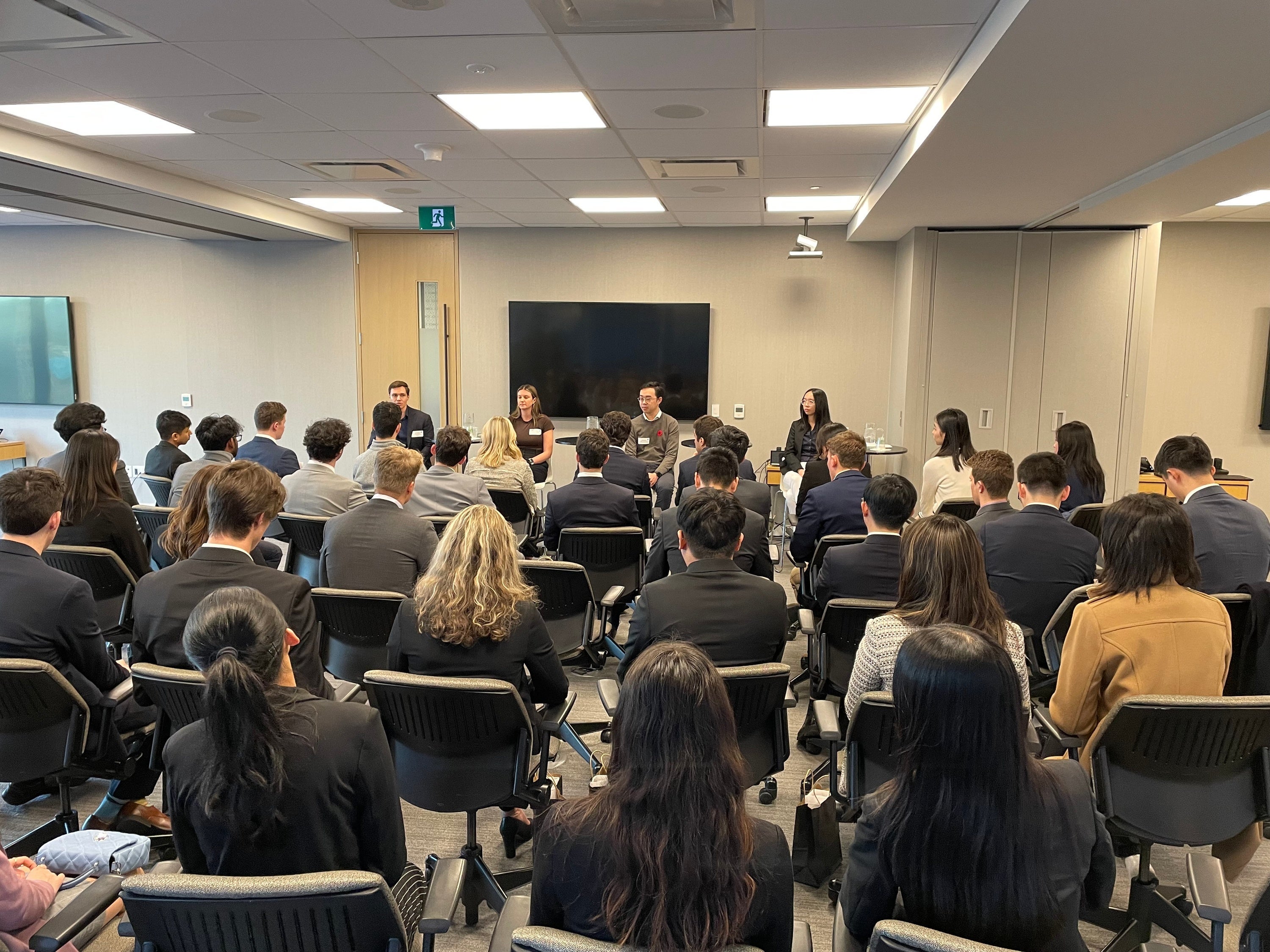 OMERS employees and co-op students in a large in-person meeting