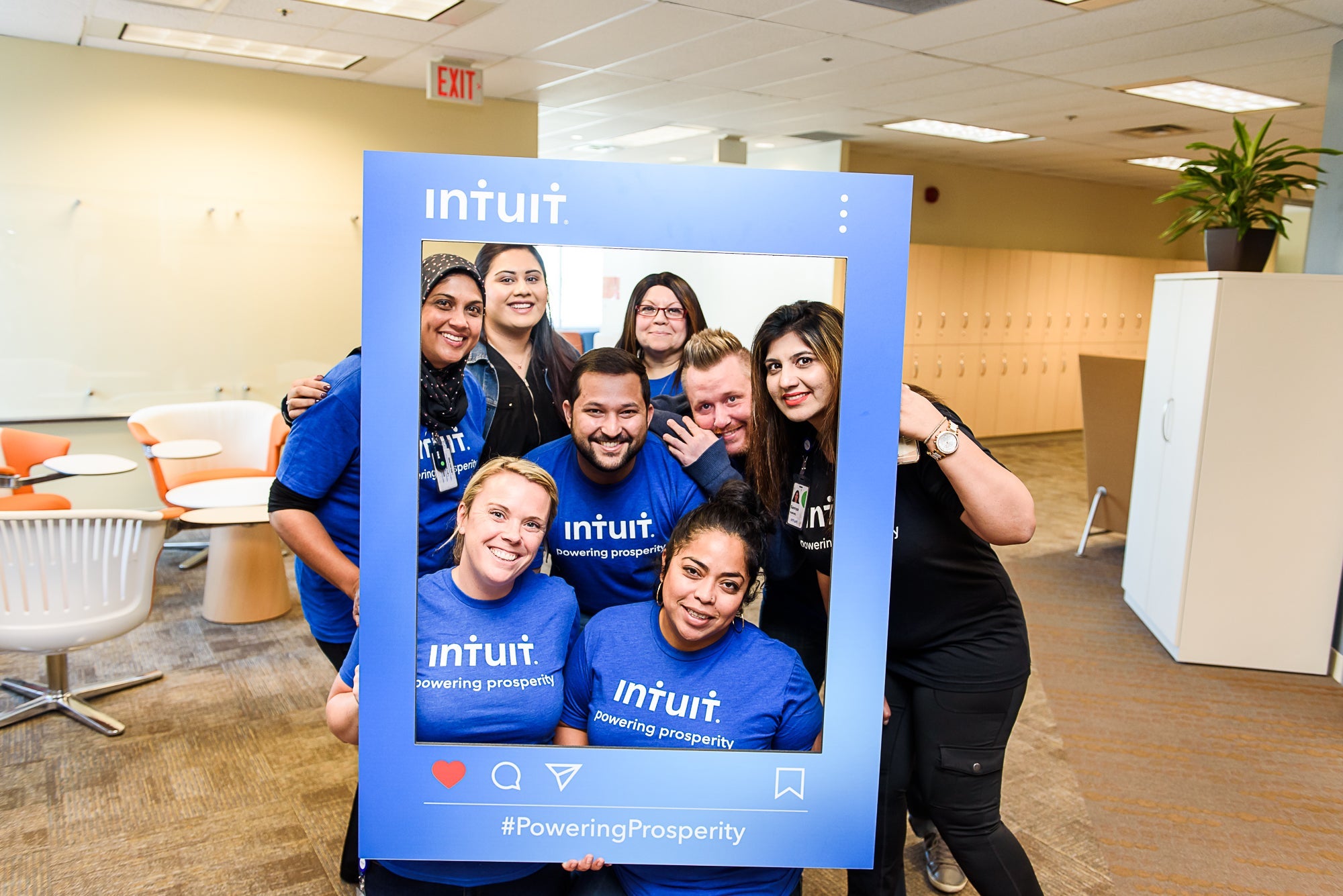 #PoweringProsperity Inuit team members posing for a photo with a custom social photo frame.