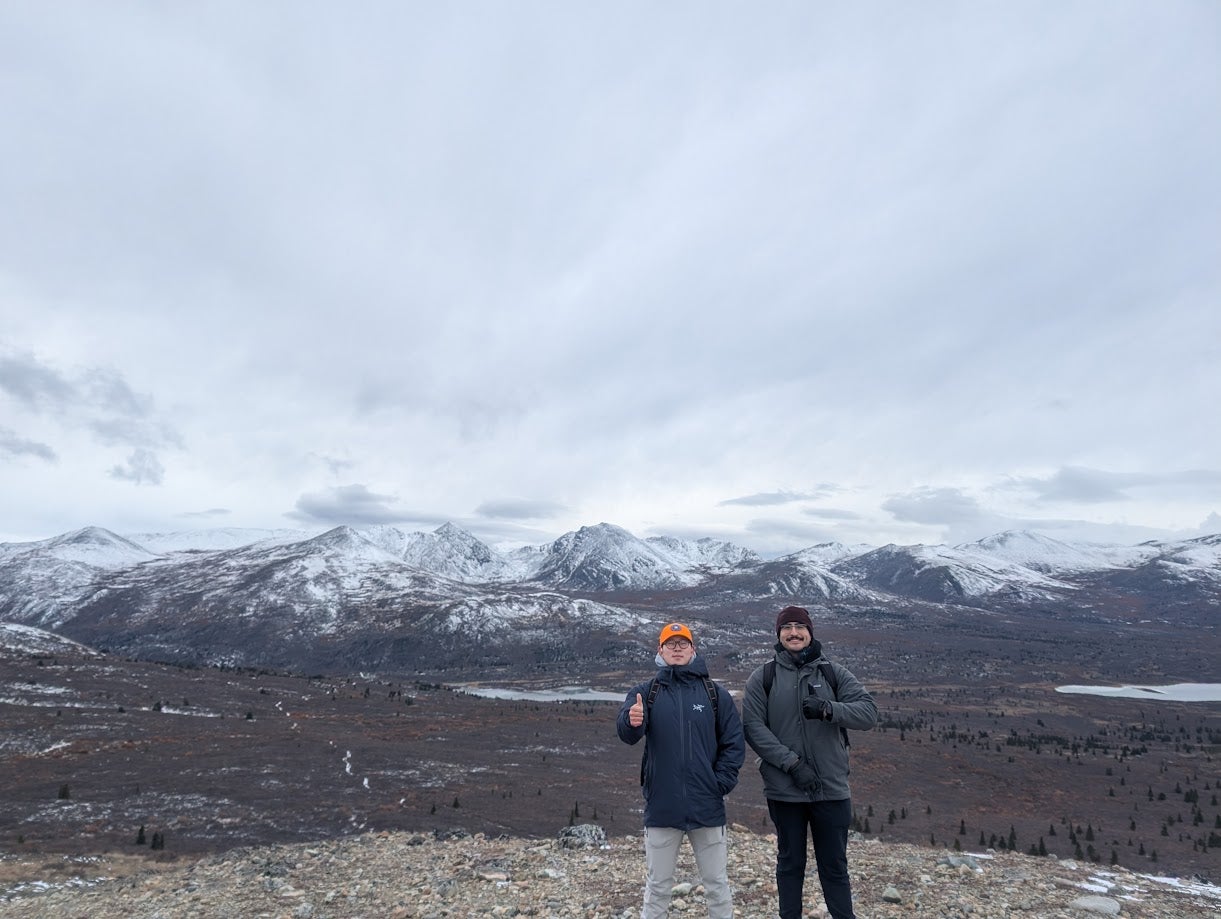 Waterloo co-op students pose in front of the mountains in Whitehorse