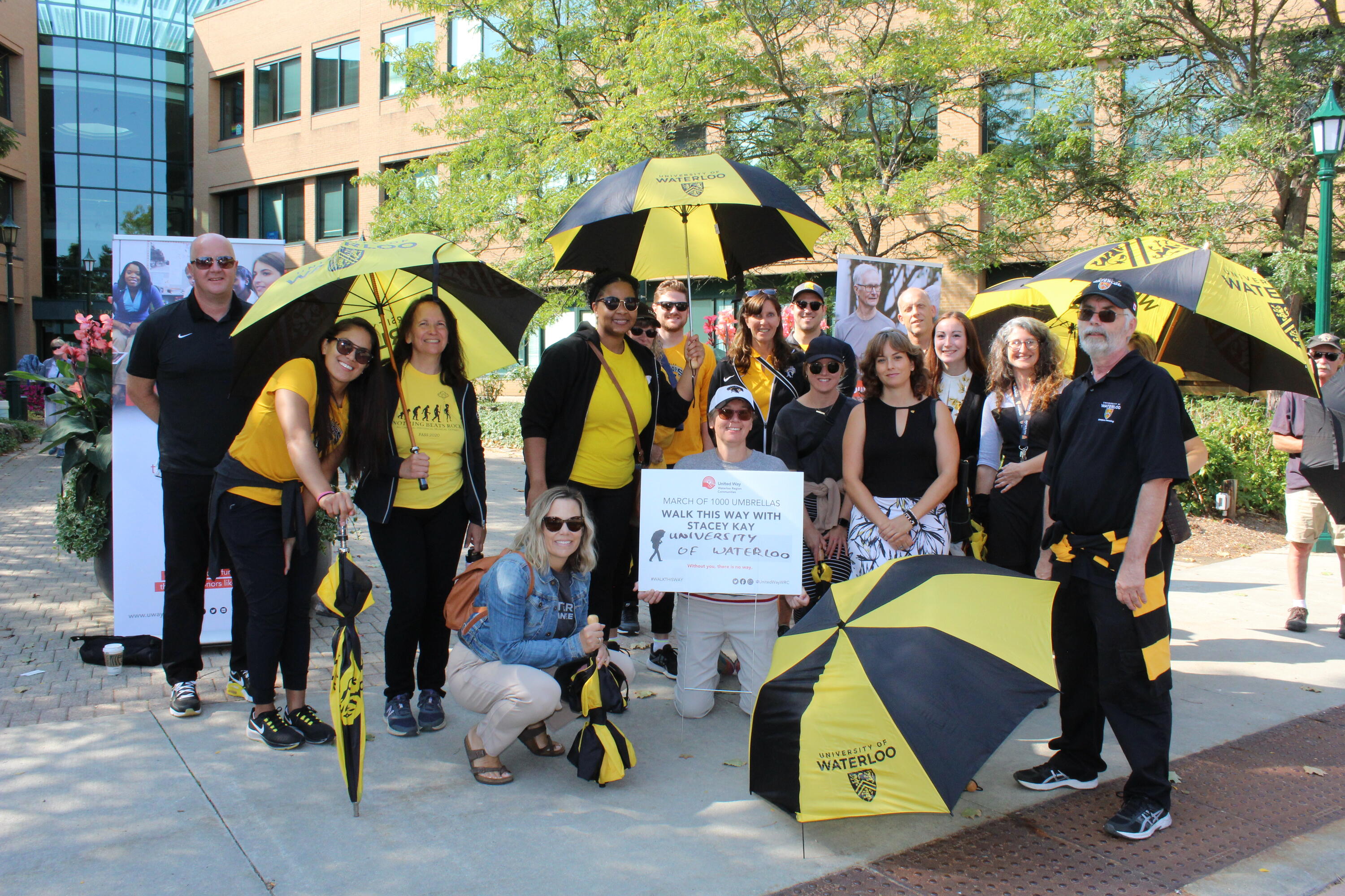 Group of United Way WRC employees and co-op students repping black and gold UWaterloo swag