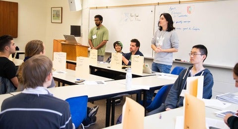 Students participating in class game session