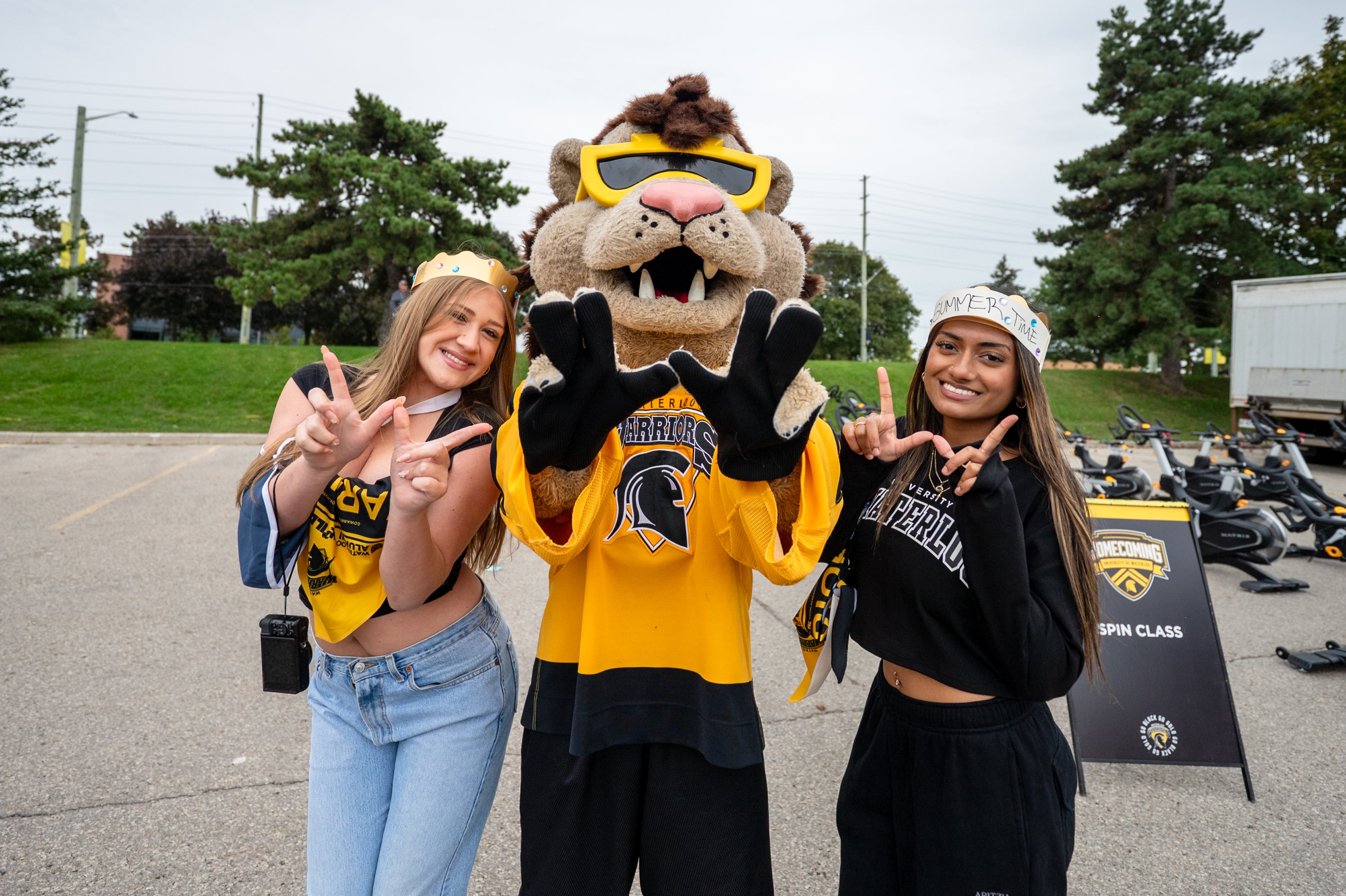 students with waterloo mascot, king warrior