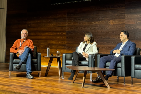 Adam Vitalis moderates a panel at a School of Accounting and Finance sustainability conference