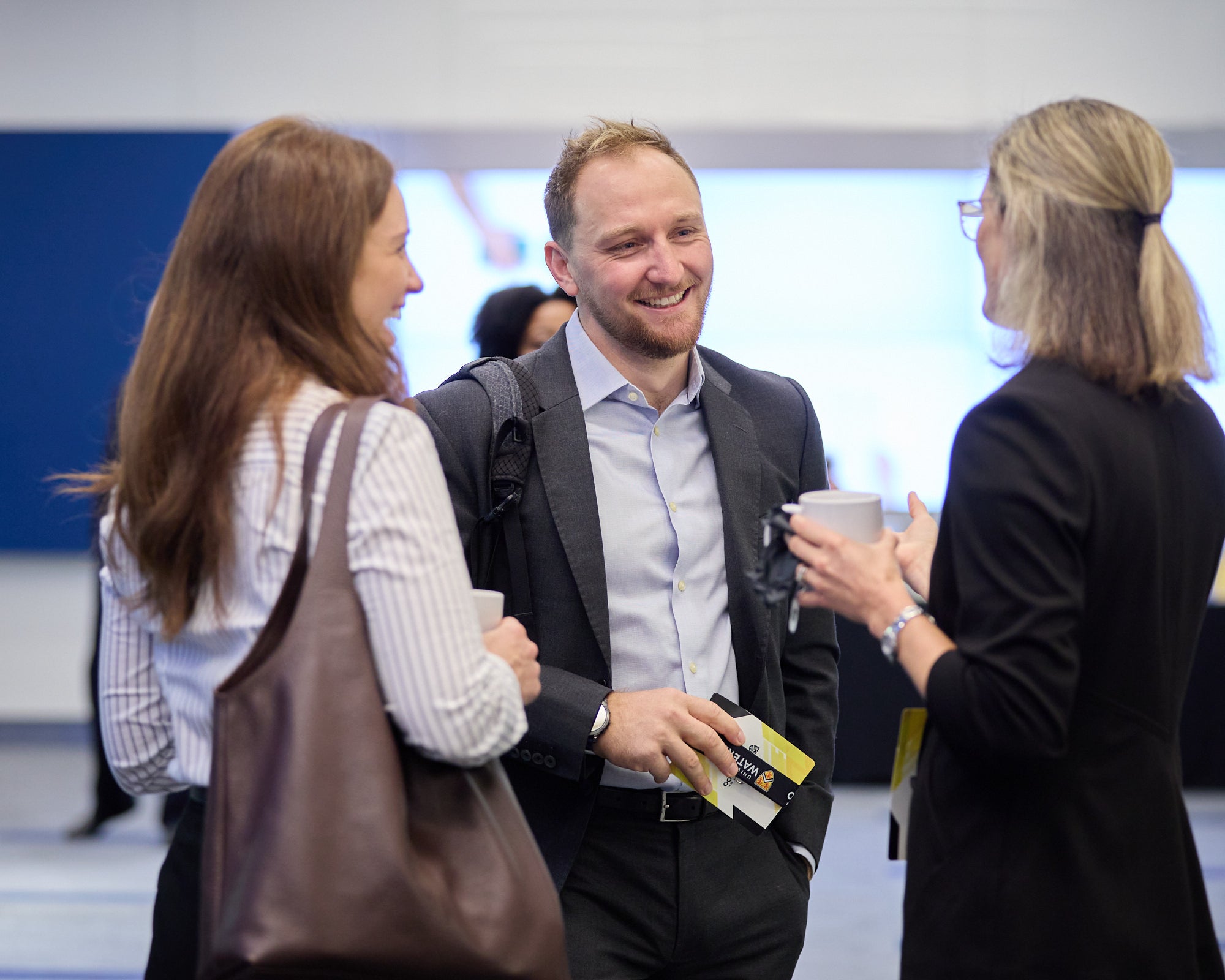 Guests mingle during a networking break