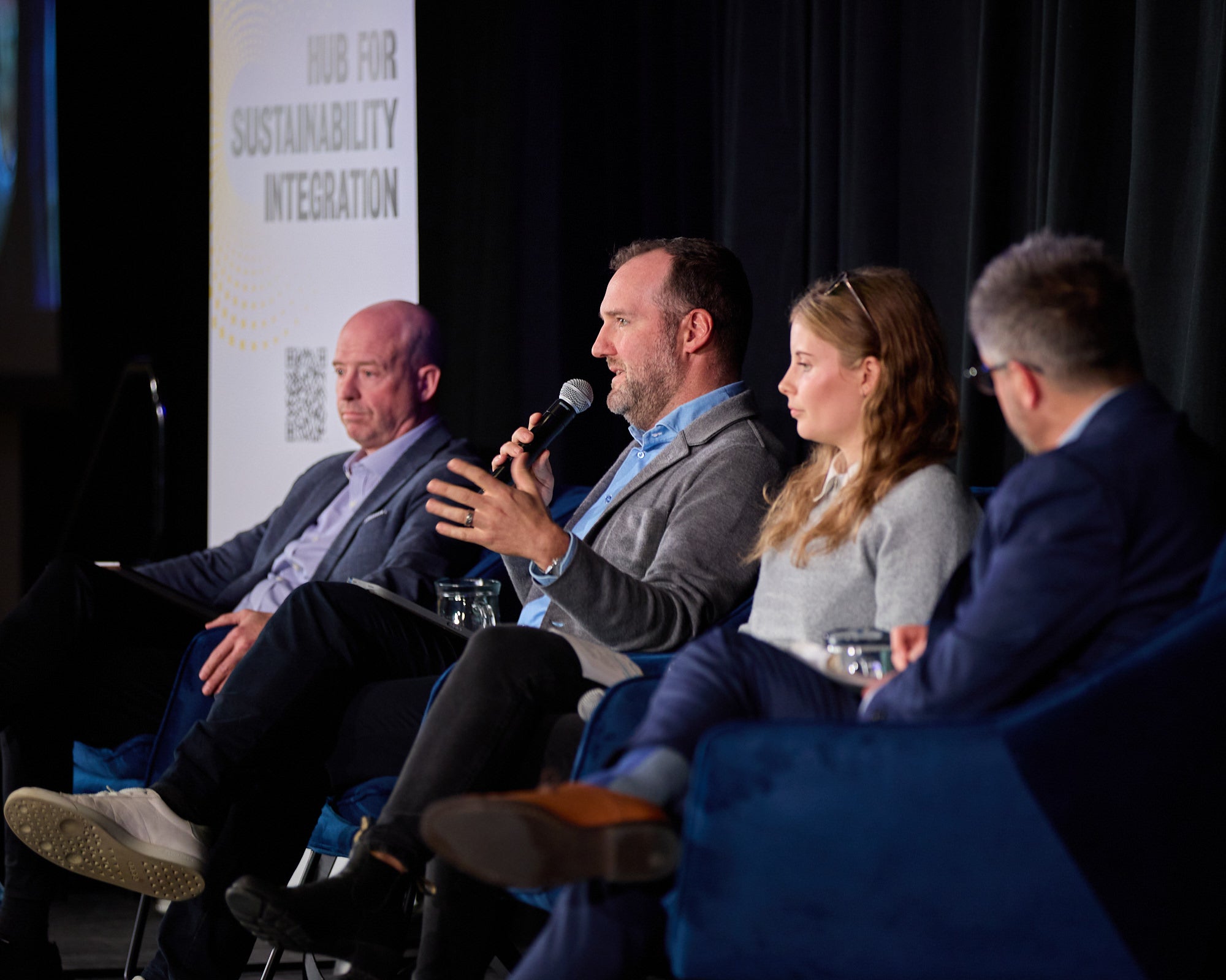 "Tackling Physical Risks" panel of speakers on stage at the Hub Conference