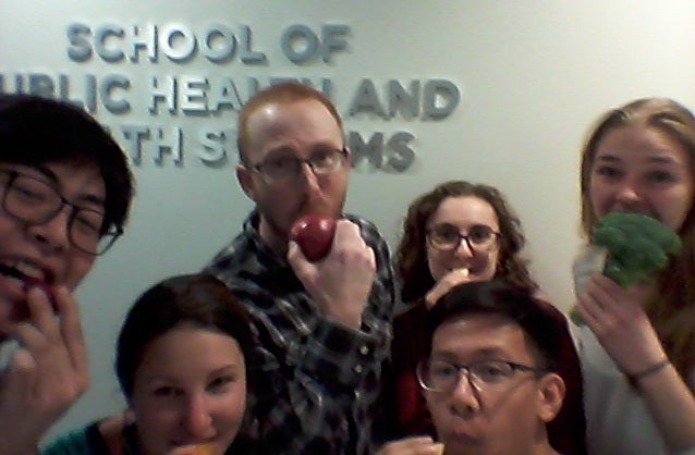 The Laird Lab Group eating fruits and vegetables
