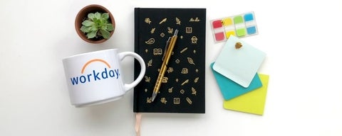 Workday mug with stationary items
