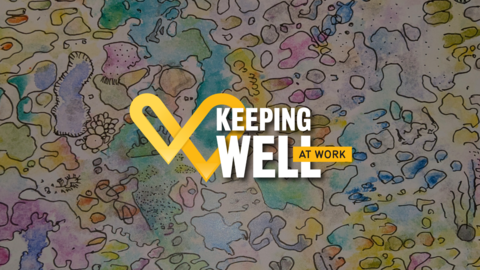 Keeping Well at Work logo on a canvas of watercolour splotches