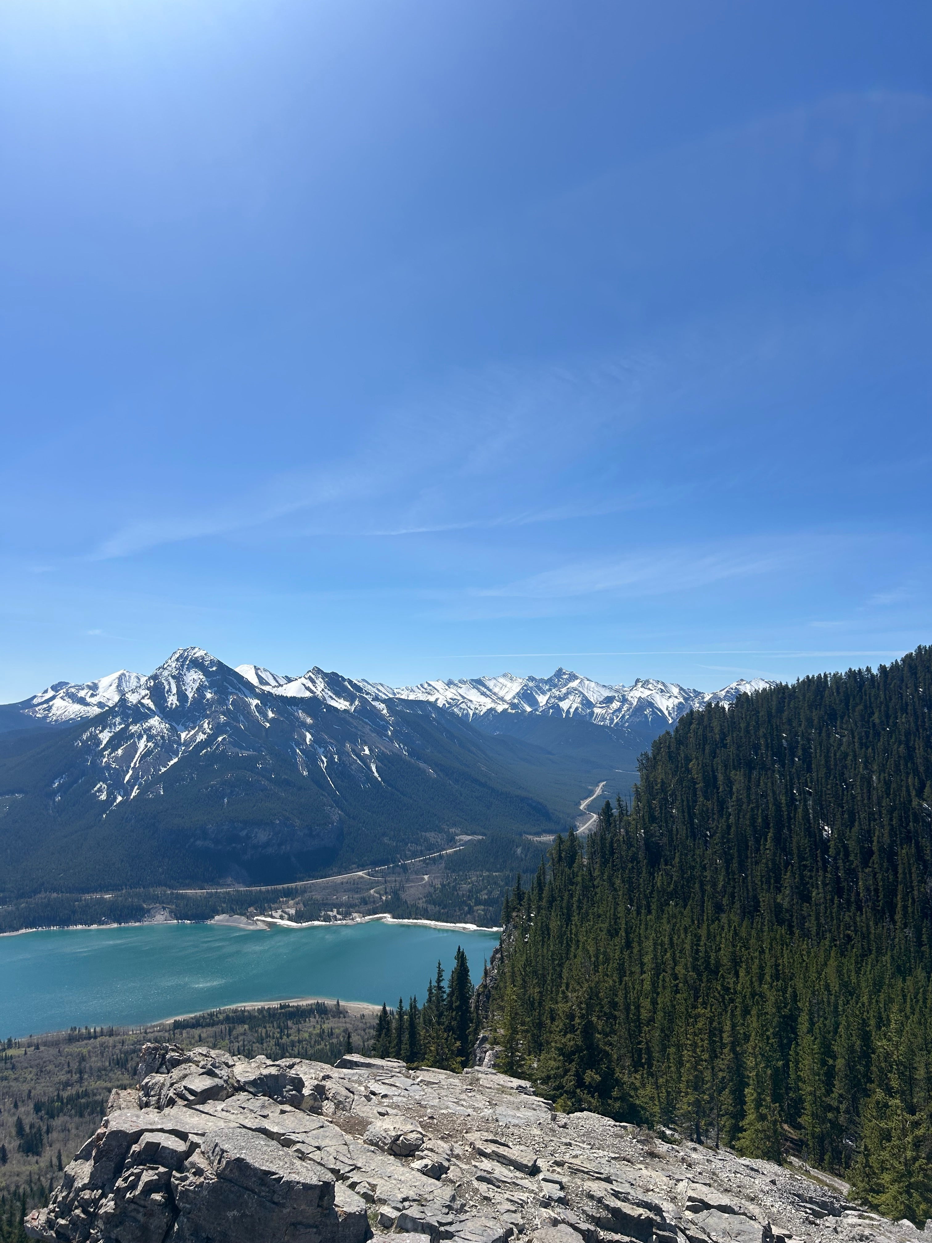 rocky mountains facing towards lake