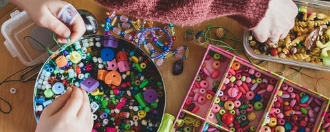 Colourful boxes of beads