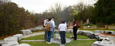 Student standing in a circle