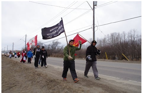 Young protestors from Idle No More marching
