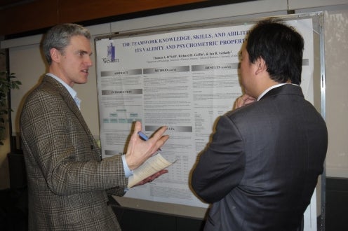 Poster Session with Dr. Peter Hausdorf and a conference participant