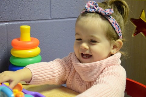 Girl playing with toys