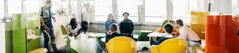 People meeting in a colourful office space