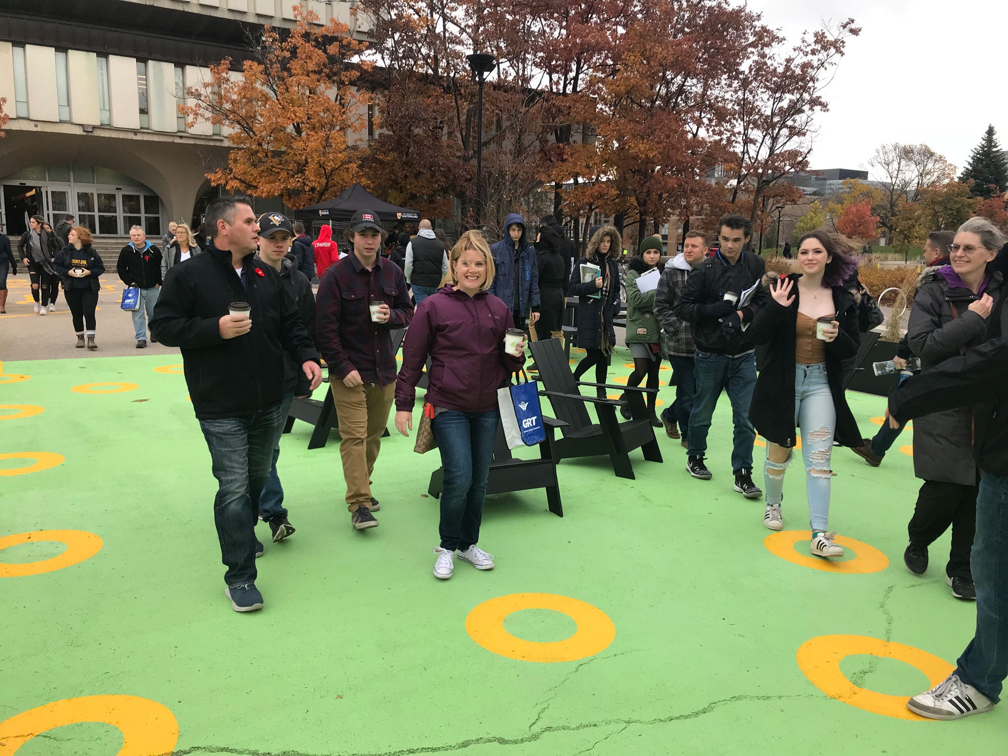 Students and parents walking through the space