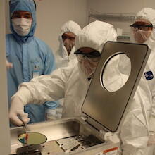 Four students conducting an experiment in the Quantum-Nano Fabrication and Characterization Facility