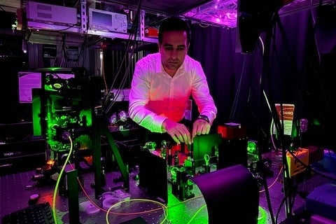 Abdolreza Pasharavesh experimenting with green and pink lasers