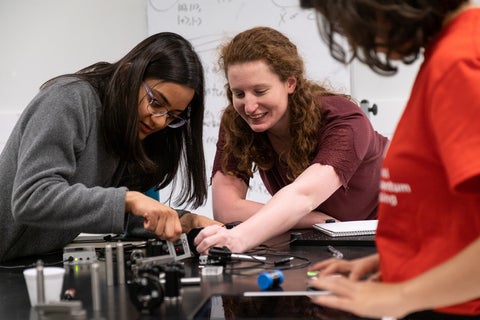 Students at USEQIP doing an experiment