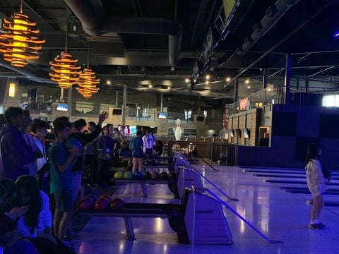 Students at a bowling alley