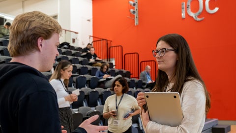 Two Quantum Innovators participants talking