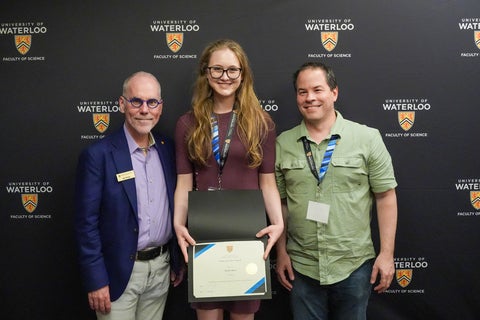 Nicki Shaw, her supervisor German Sciaini, and chemistry chair John Corrigan