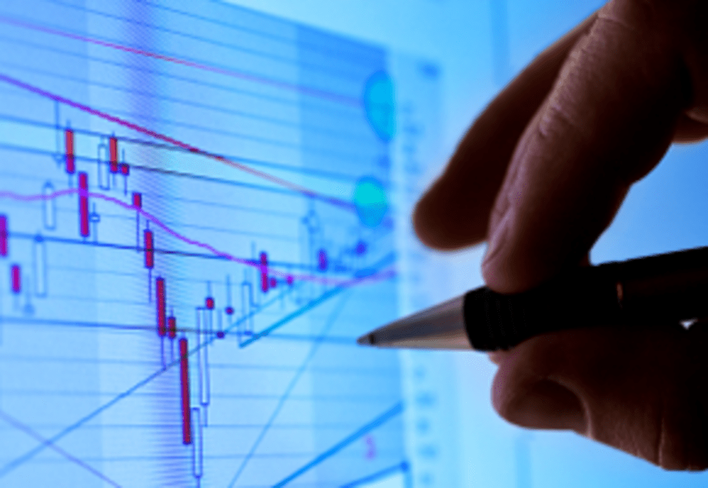 A hang drawing a graph on a digital screen