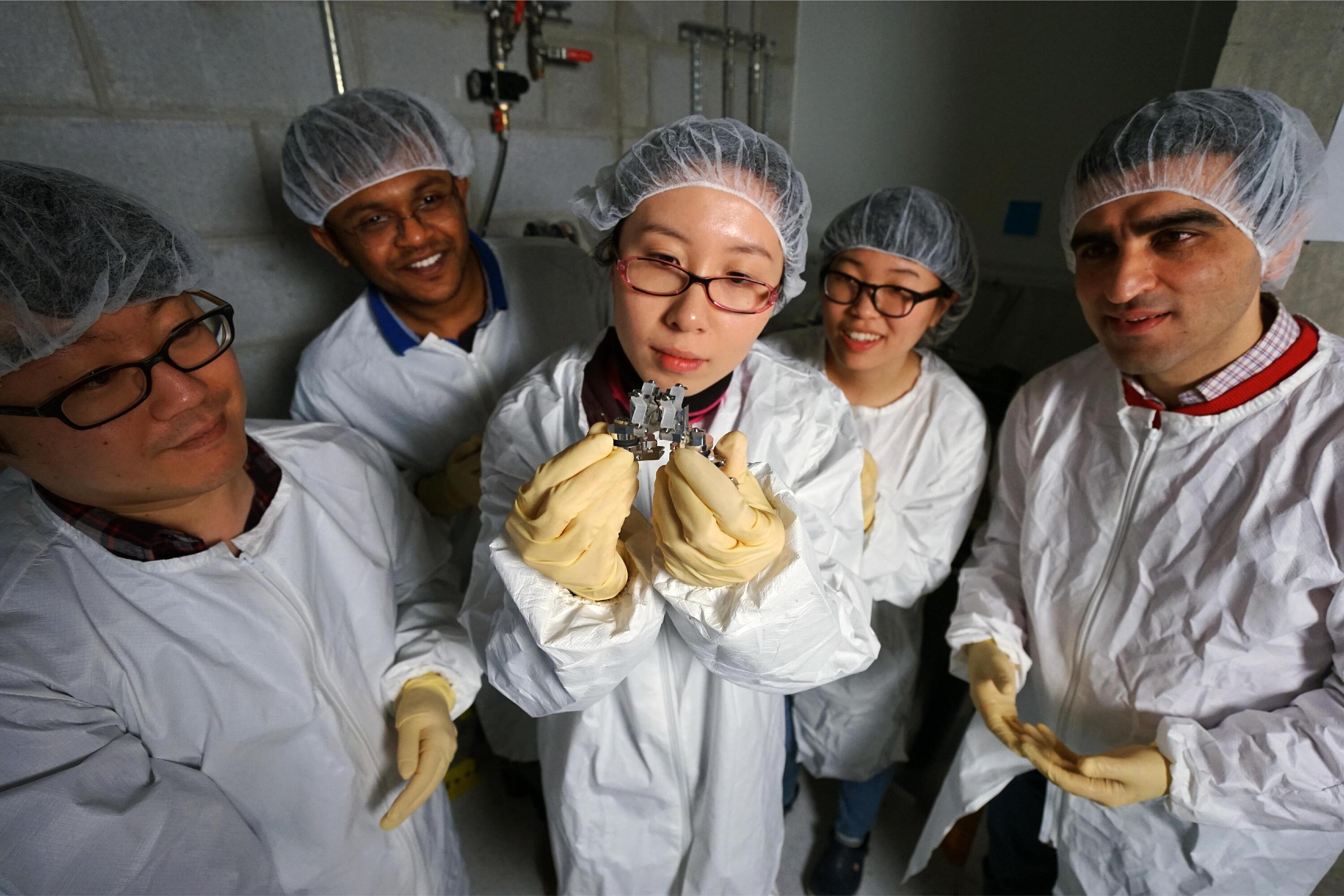 Researchers in a Quantum Nano Centre lab