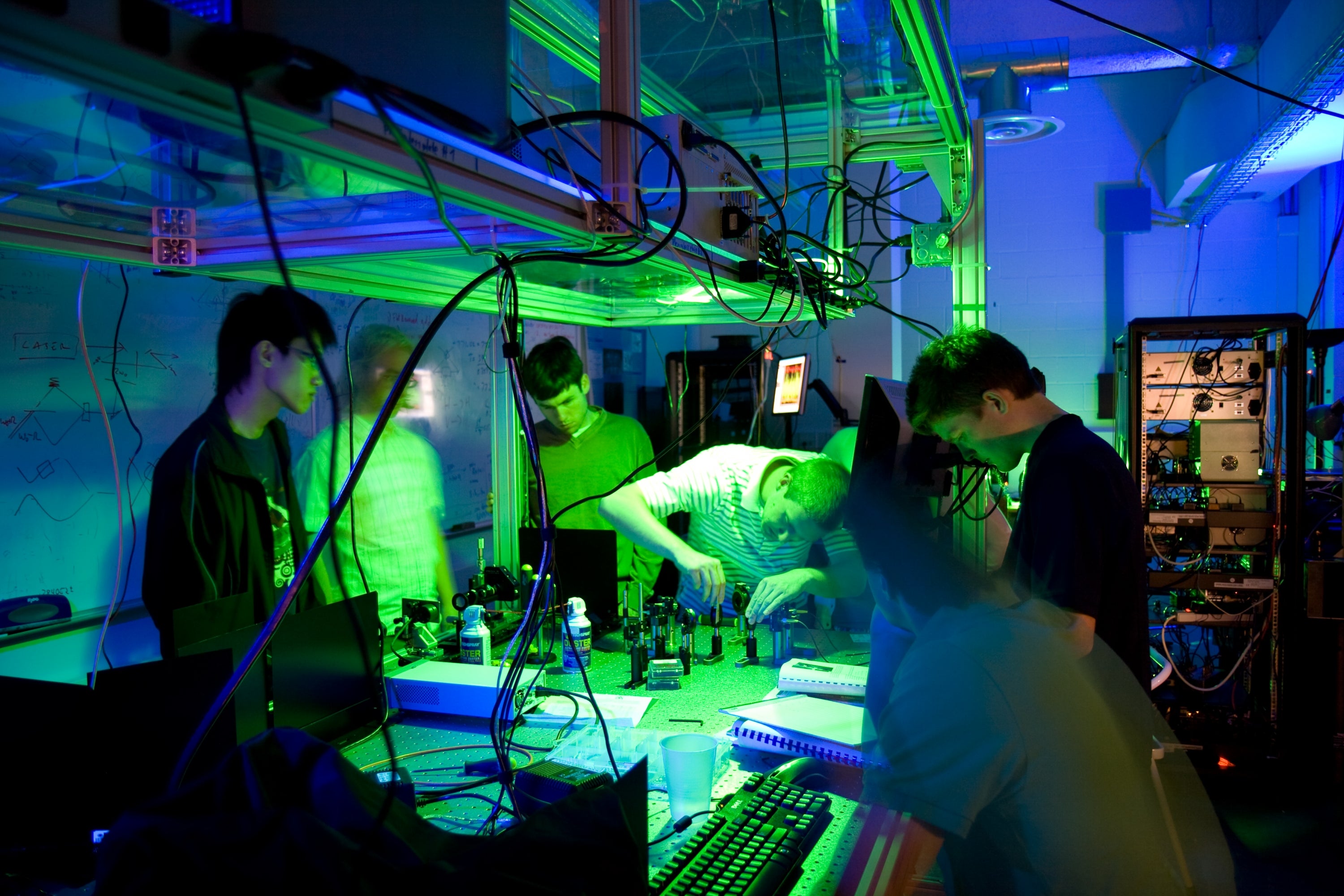 Students work in the Quantum Optics and Quantum Information Lab