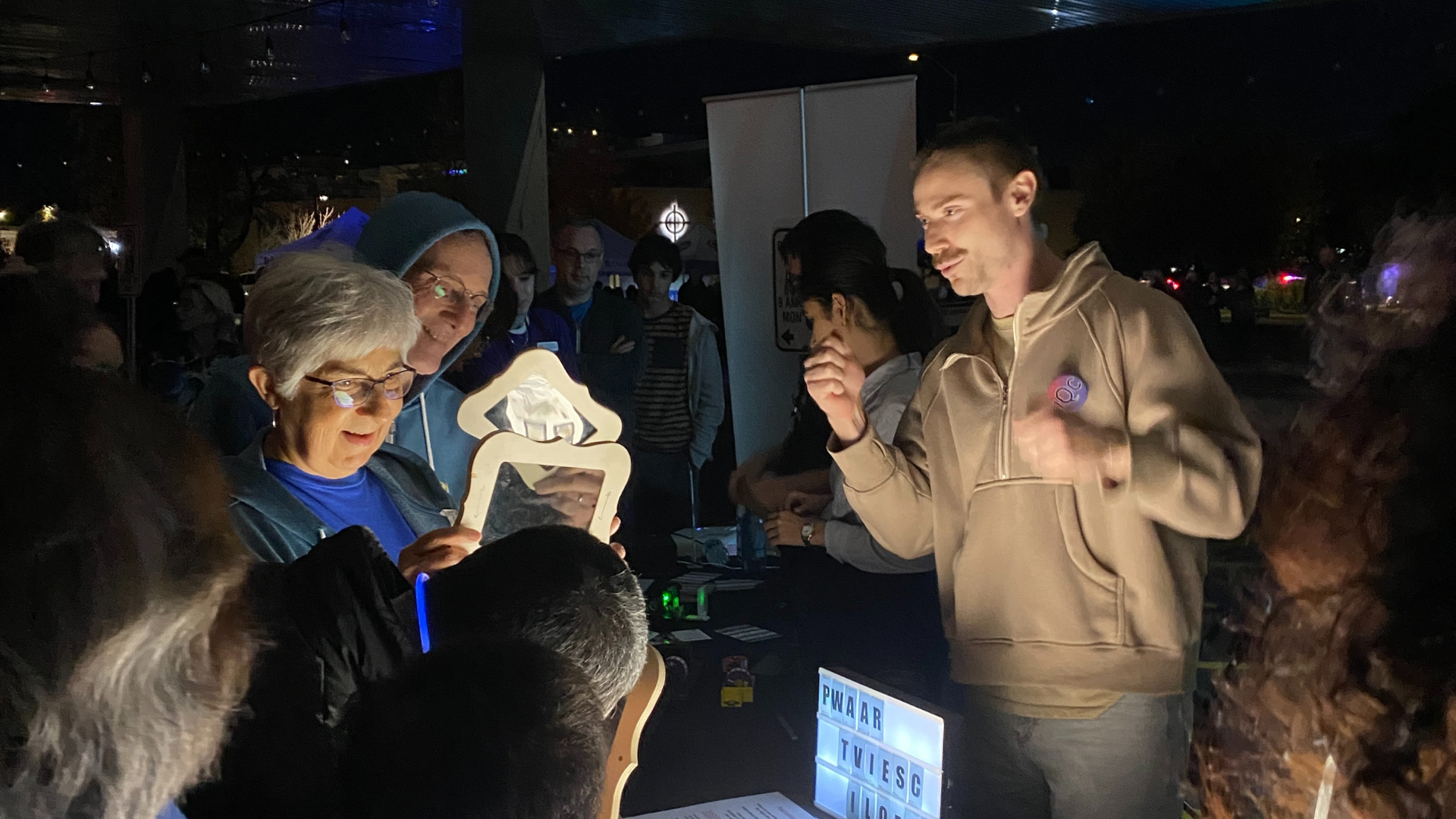 A man speaking to a group of people 