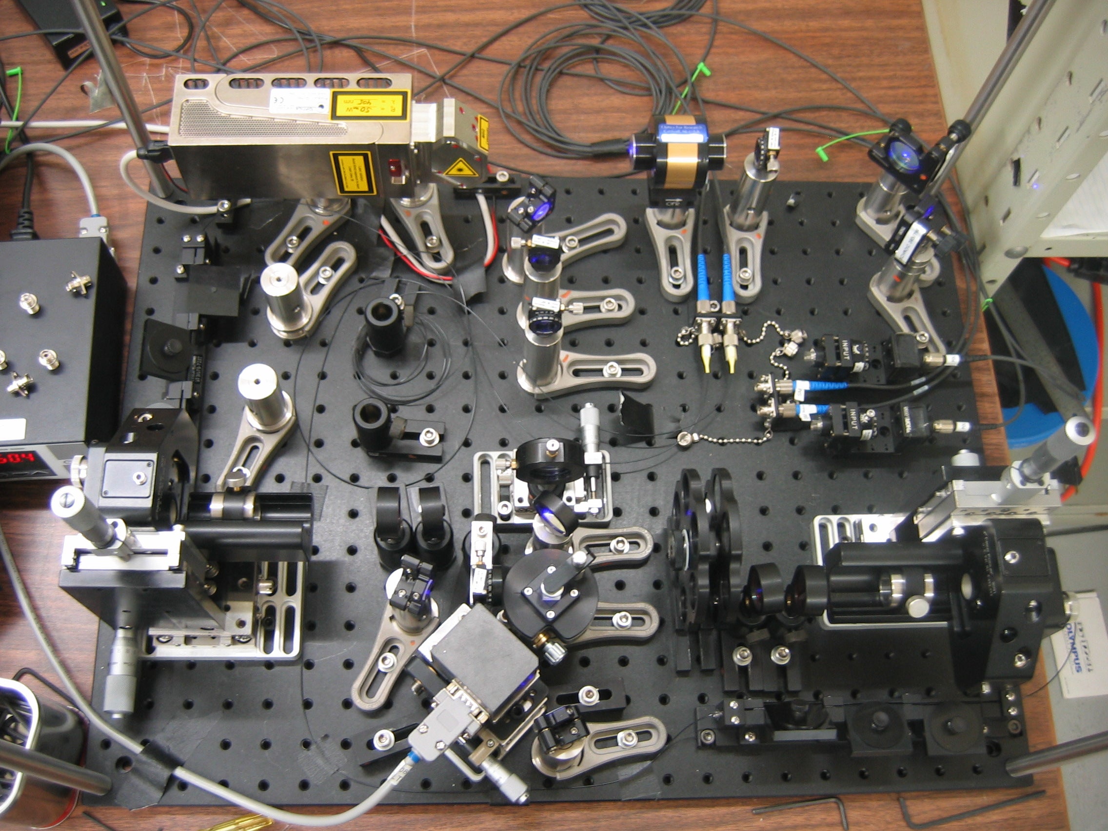 Experimental apparatus to produce entangled photons.