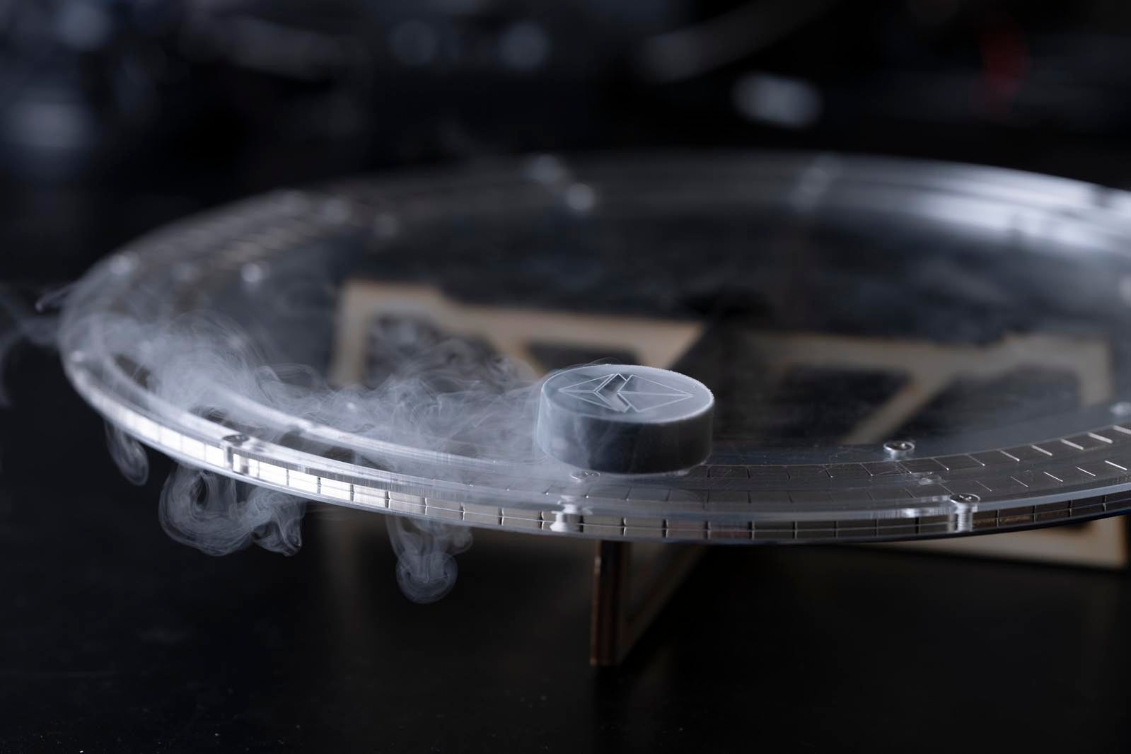 Magnet levitating on a nitrogen-cooled superconductor track.