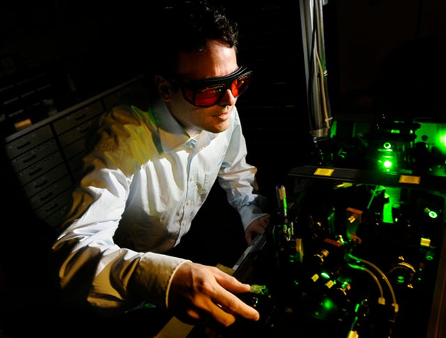 IQC researcher Thomas Jennewein in the lab