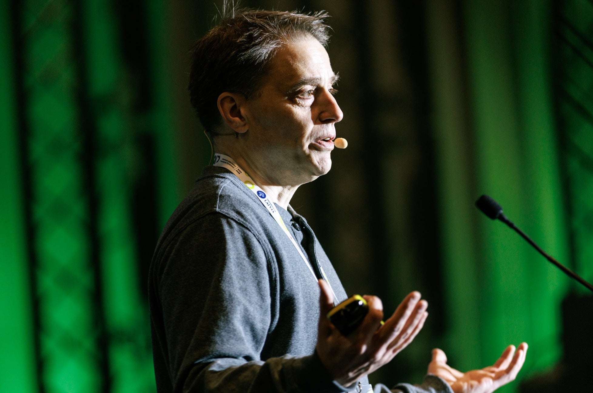 Dr. John Watrous speaks on stage at the QIP conference 2026 in Riga, Latvia.