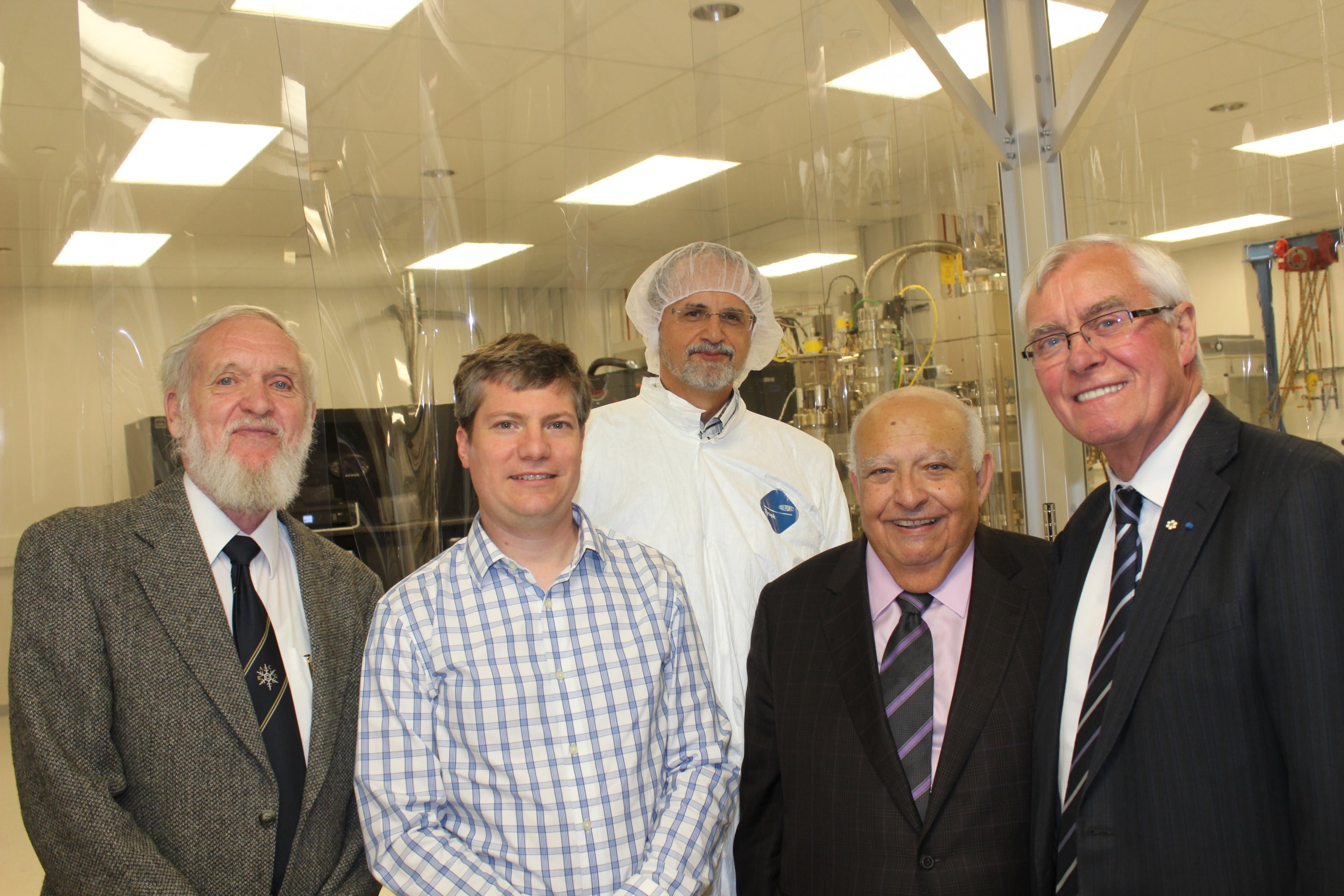 Drs Tom Foxon, Jonathan Baugh, Zbig Wasilewski, Adel Sedra and Arthur Carty outside the QNC MBE lab