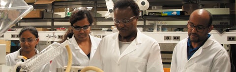 Banner professor and students in the lab