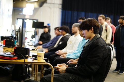 Participants playing Smash Bros at Empty Throne Two