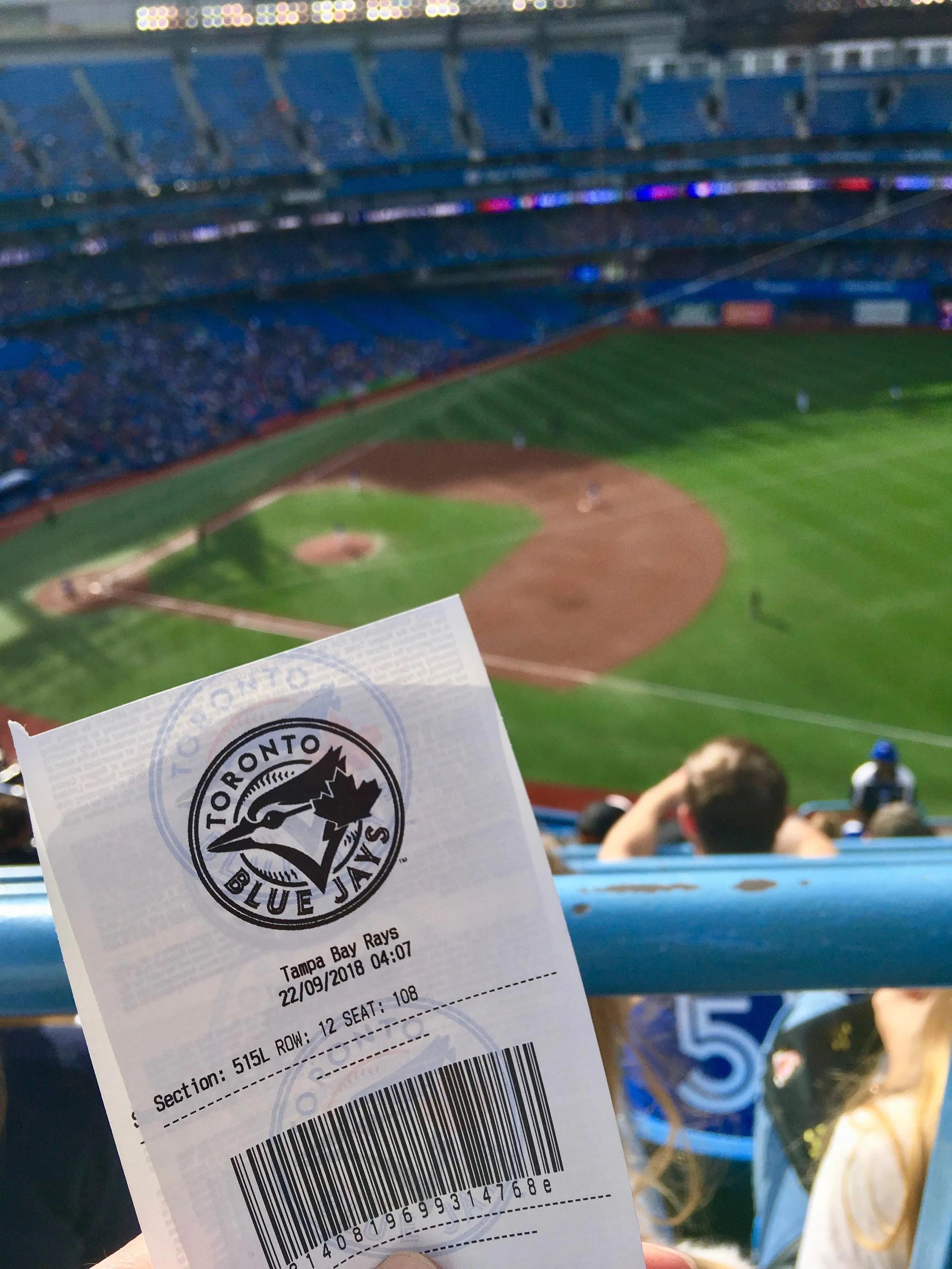 Blue Jay's game ticket in front of the diamond at Roger's Centre.