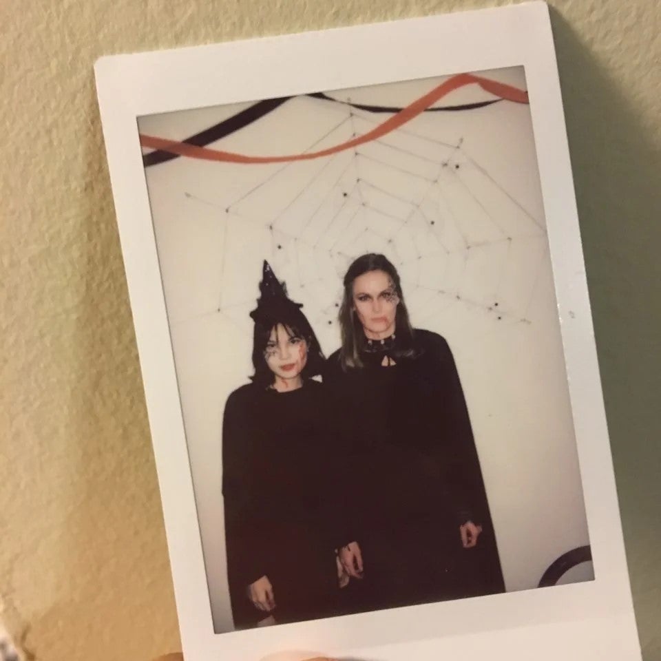 A Polaroid of Si Yon and a friend in costume.
