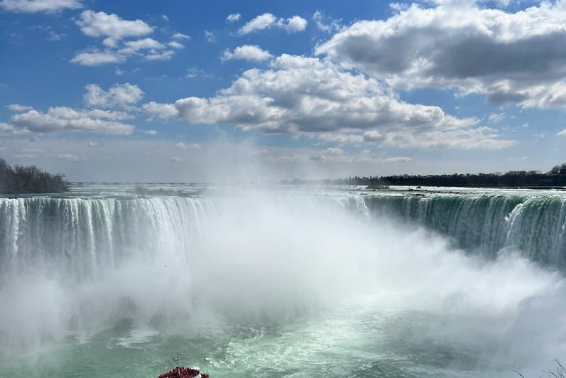 A boat in the waters below Niagara Falls