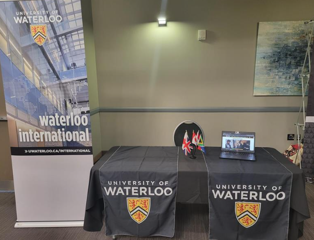 Waterloo International table at faculty orientation event
