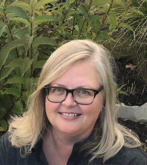 Julie Koreck in a garden