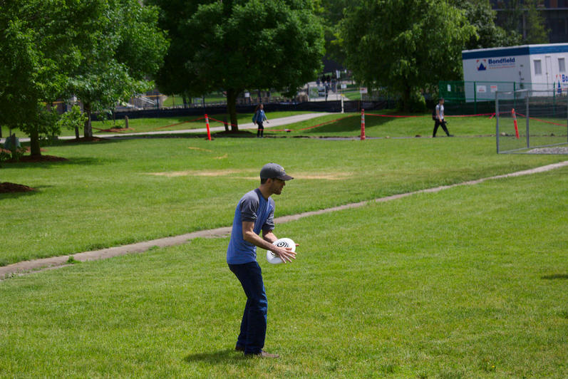 person throwing frisbee