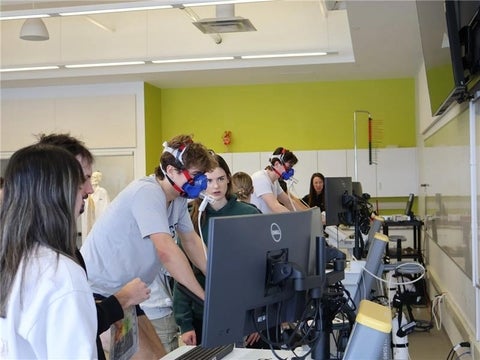 Students performing VO2 testing in lab