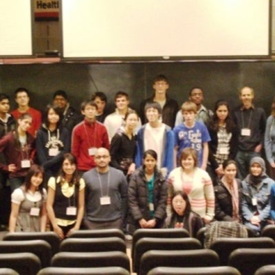 crowd of student participants with professor