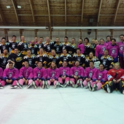 Team Pink and Team Gold together on the ice